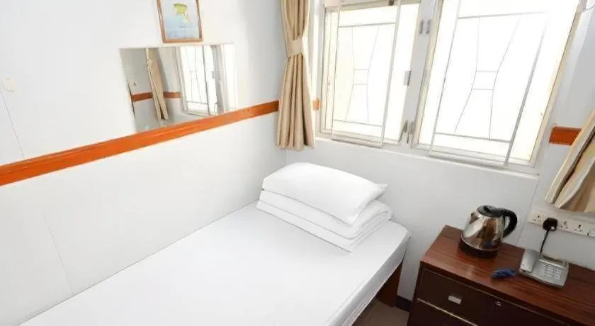 Bed in New Mong Kok Guest House