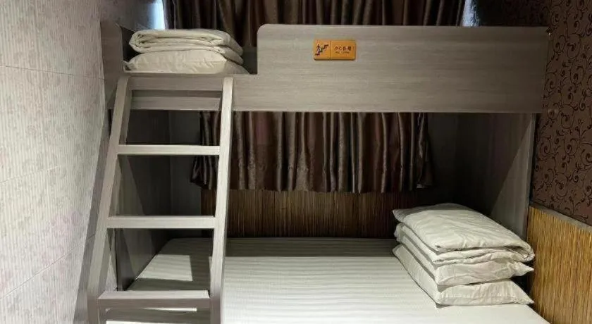 Bed in New Mong Kok Guest House