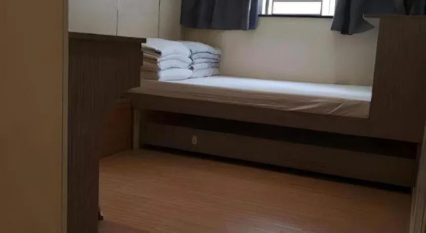 Bed in New Mong Kok Guest House