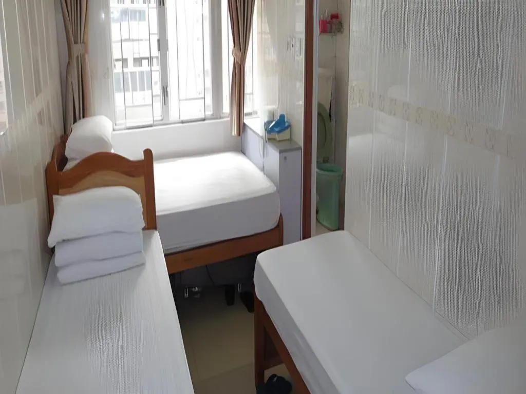 Bed in New Mong Kok Guest House