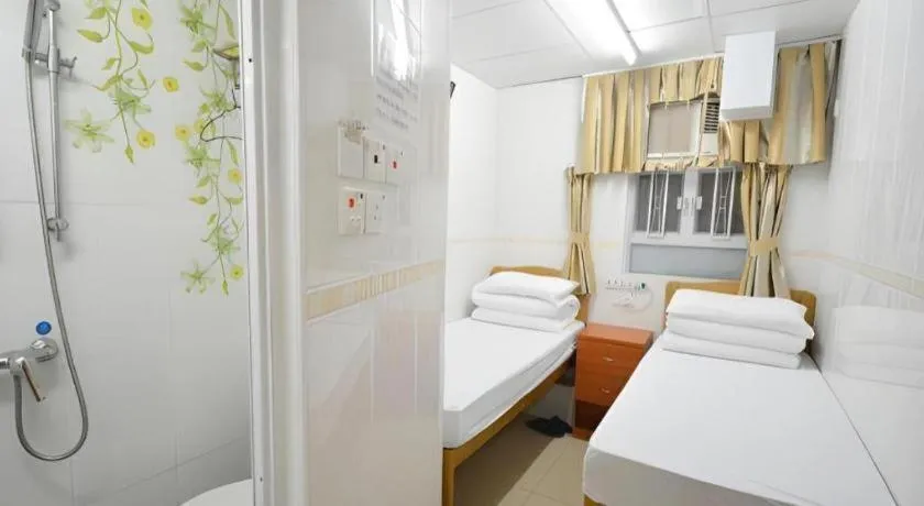 Bed in New Mong Kok Guest House