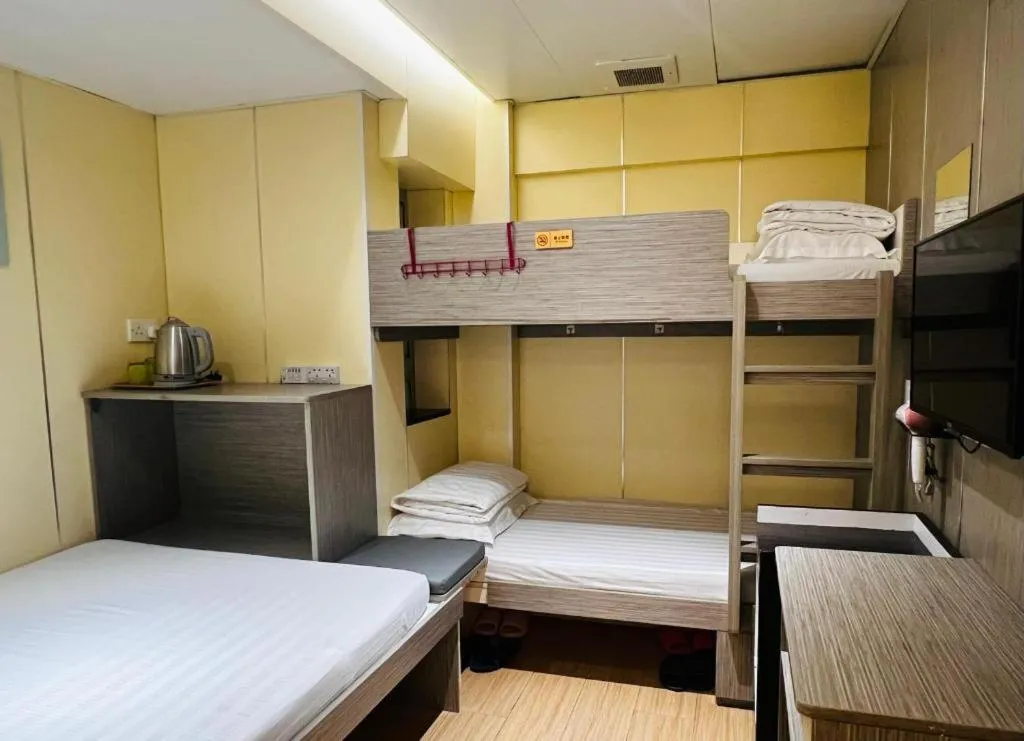 Bed in New Mong Kok Guest House