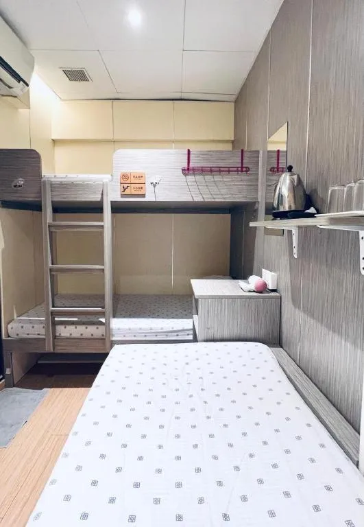 Bed in New Mong Kok Guest House