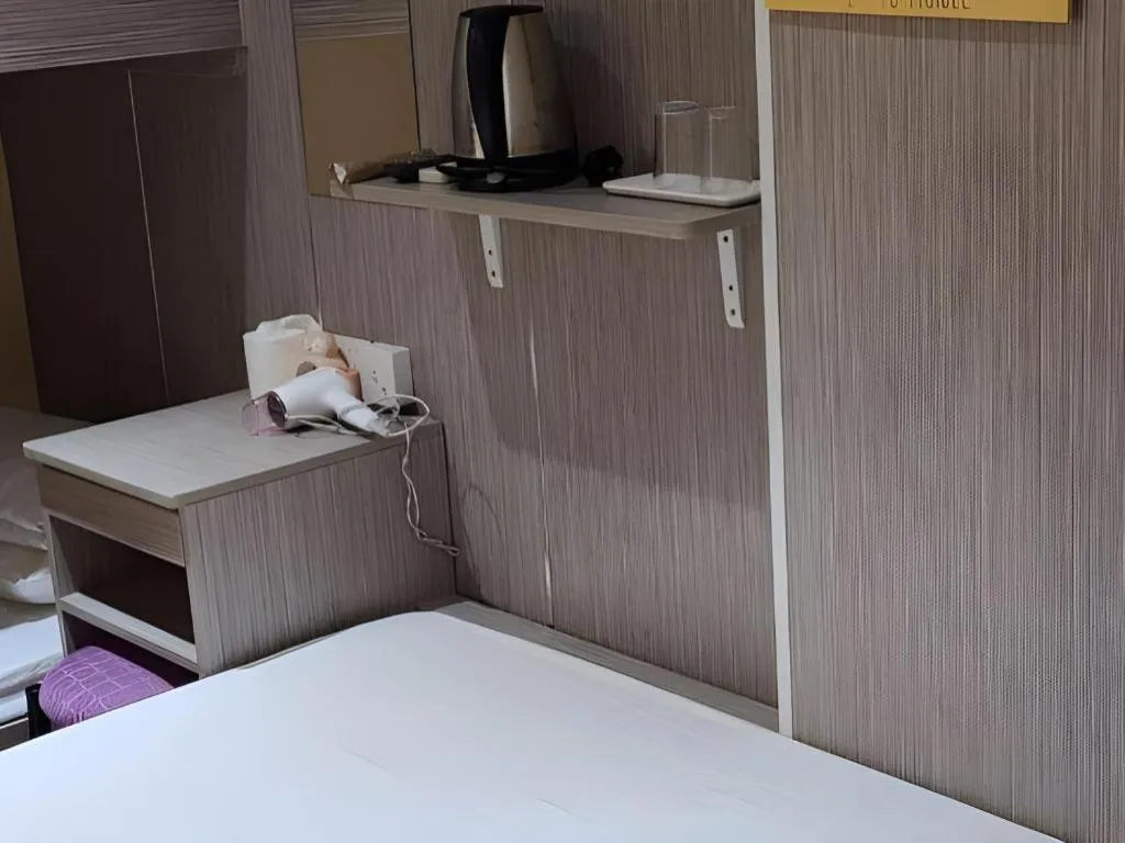 Bed in New Mong Kok Guest House