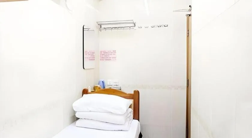 Bed in New Mong Kok Guest House