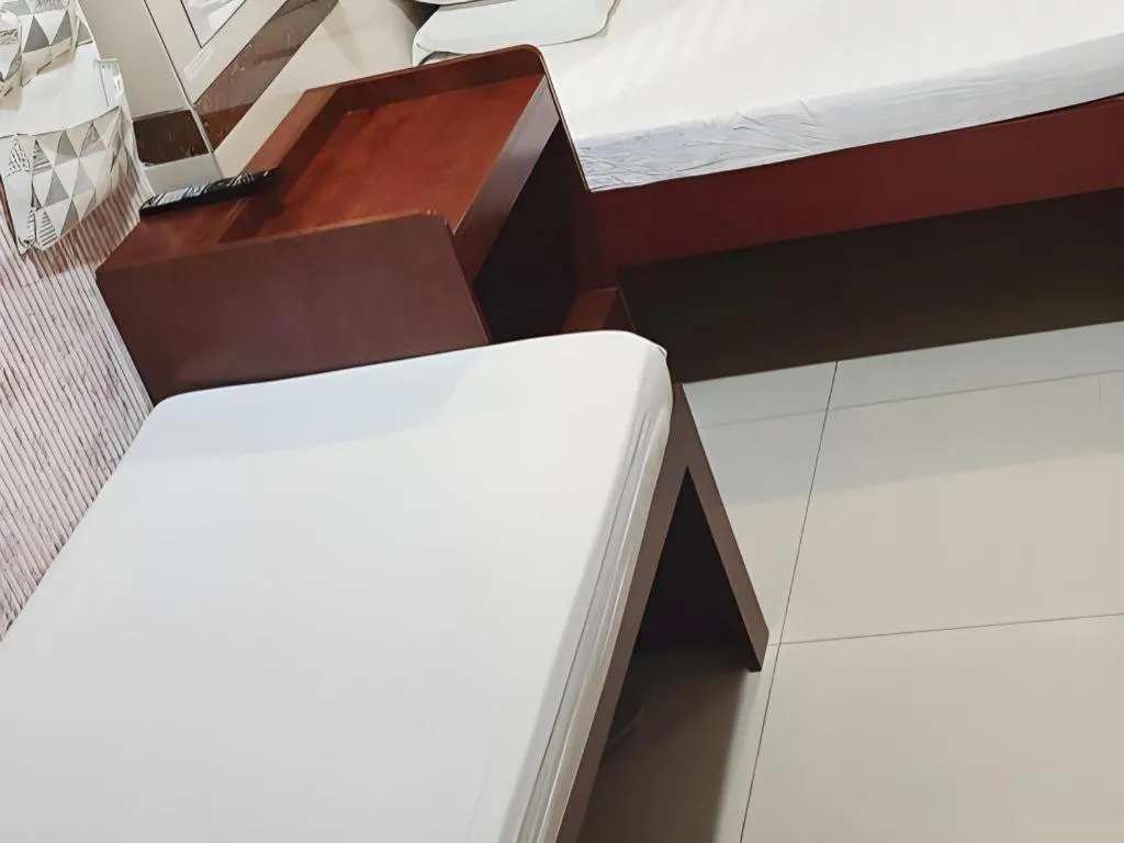 Bed in New Mong Kok Guest House