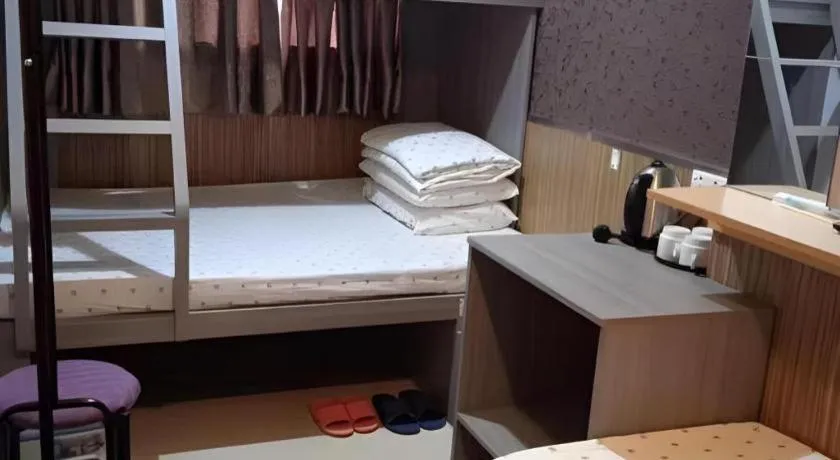 Bed in New Mong Kok Guest House
