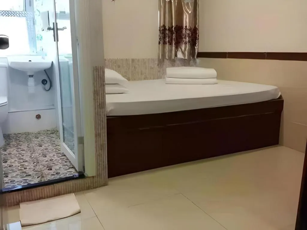 Bed in New Mong Kok Guest House