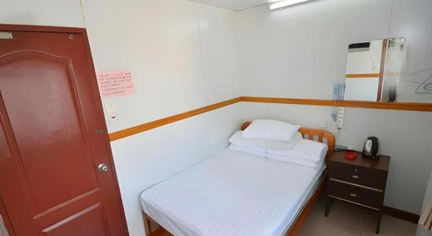 Bed in New Mong Kok Guest House