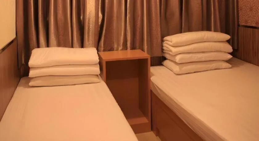 Bed in New Mong Kok Guest House