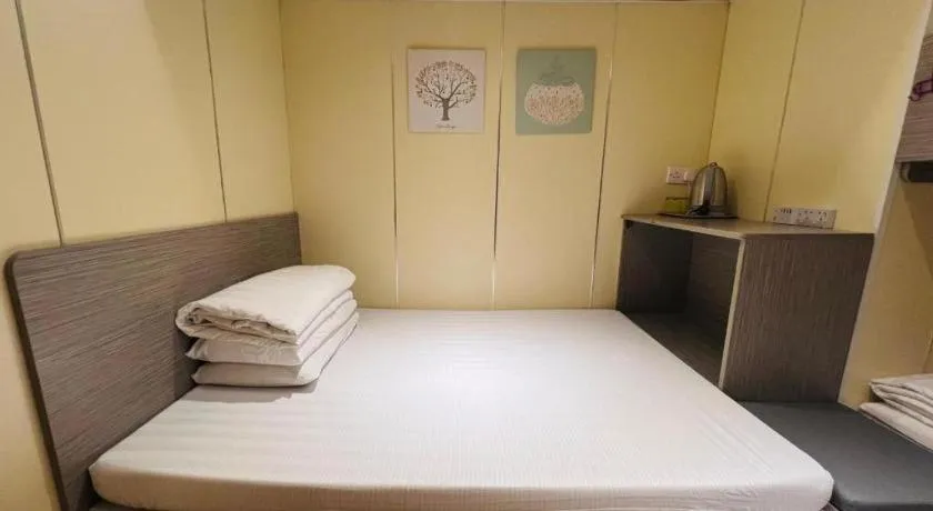 Bed in New Mong Kok Guest House
