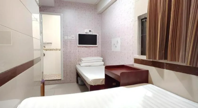 Bed in New Mong Kok Guest House