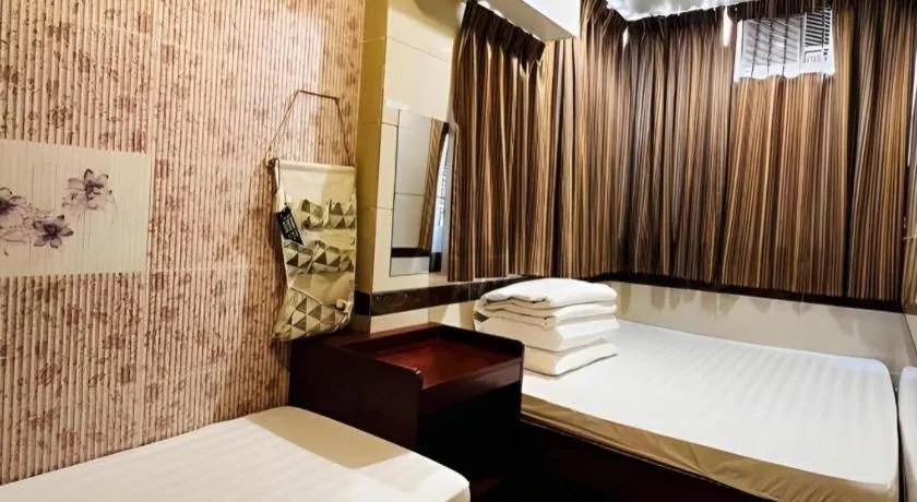 Bed in New Mong Kok Guest House