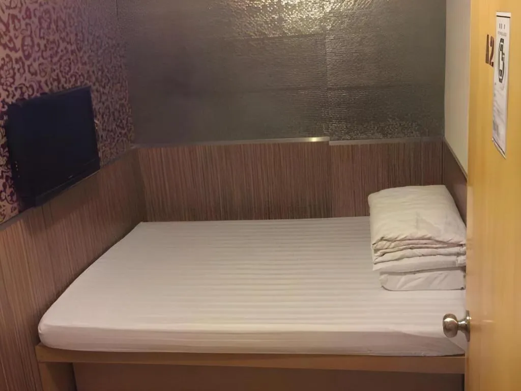 Bed in New Mong Kok Guest House
