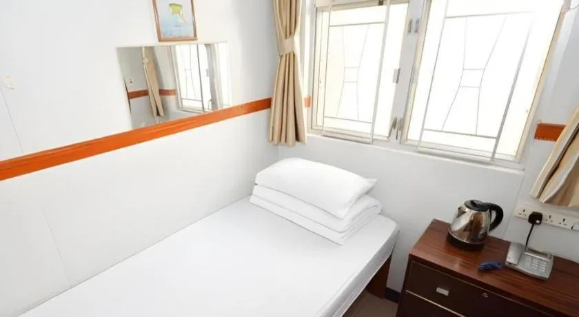 Bed in New Mong Kok Guest House