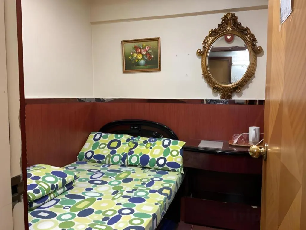 Bed in New Mong Kok Guest House