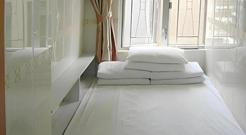 Bed in New Mong Kok Guest House