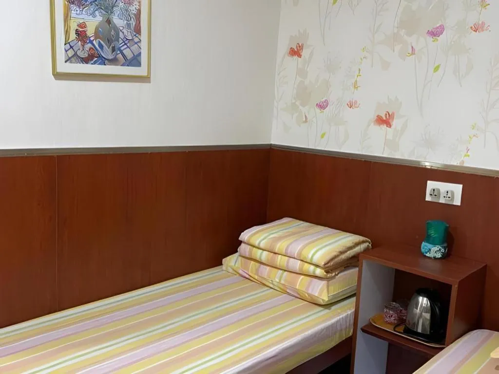 Bed in New Mong Kok Guest House