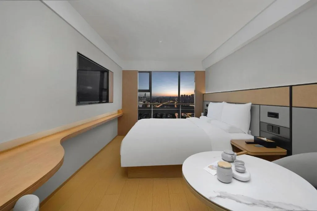 Bed in JI Hotel Chongqing Shangqing Temple