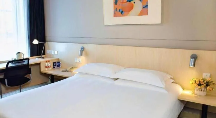 Bed in Jinjiang Inn Weihai Liugong Island Scenic Spot Shopping Market