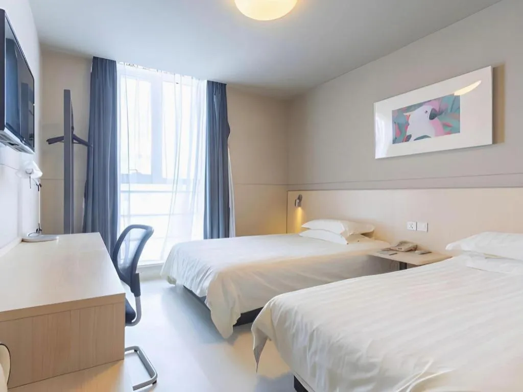 Bed in Jinjiang Inn Weihai Liugong Island Scenic Spot Shopping Market