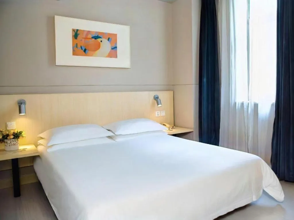 Bed in Jinjiang Inn Weihai Liugong Island Scenic Spot Shopping Market