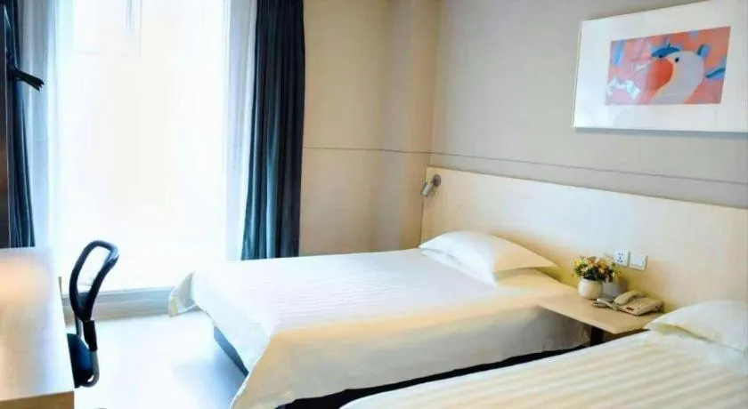 Bed in Jinjiang Inn Weihai Liugong Island Scenic Spot Shopping Market