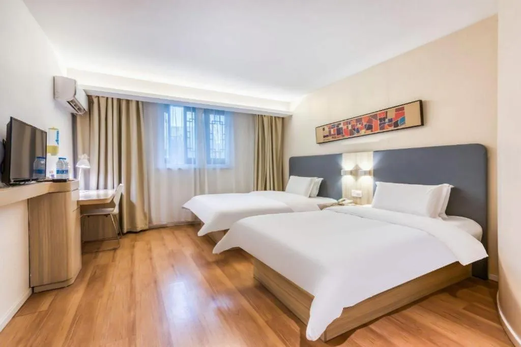 Bed in Hanting Hotel Hangzhou West Lake Longjing Road