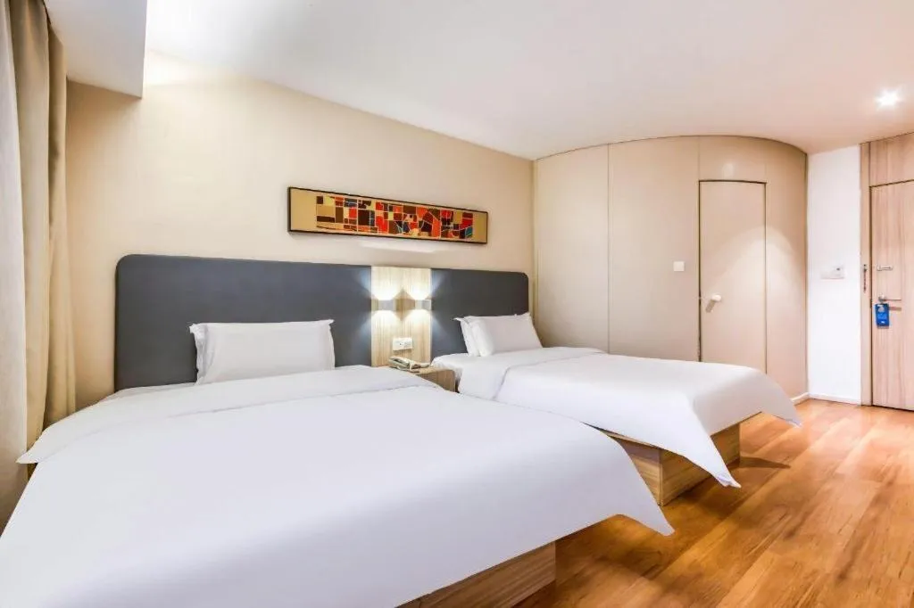 Bed in Hanting Hotel Hangzhou West Lake Longjing Road