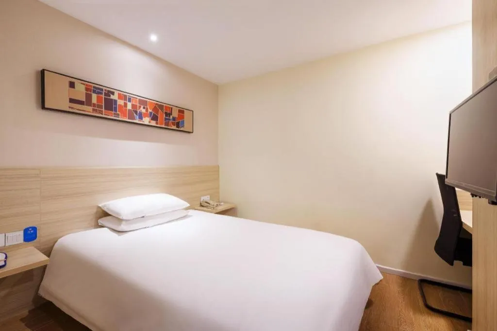 Bed in Hanting Hotel Hangzhou West Lake Longjing Road