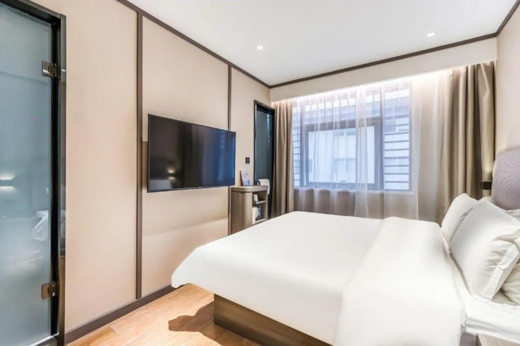 Bed in Hanting Hotel Hangzhou West Lake Longjing Road