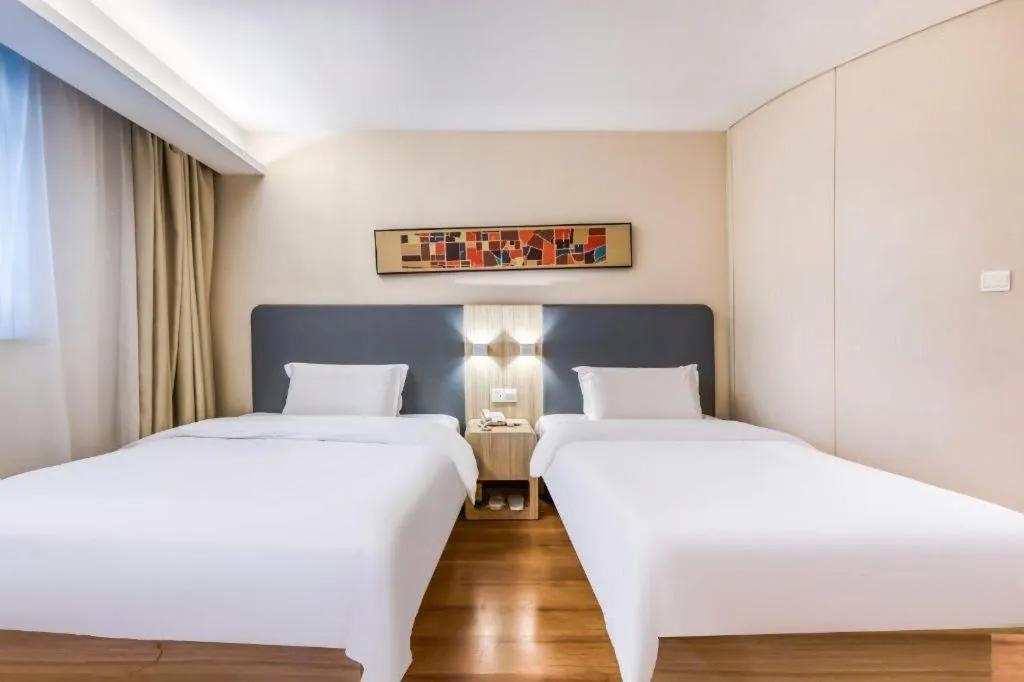 Bed in Hanting Hotel Hangzhou West Lake Longjing Road