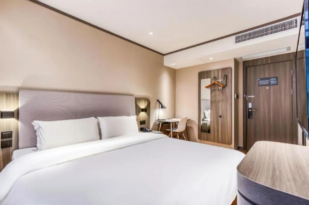 Bed in Hanting Hotel Hangzhou West Lake Longjing Road