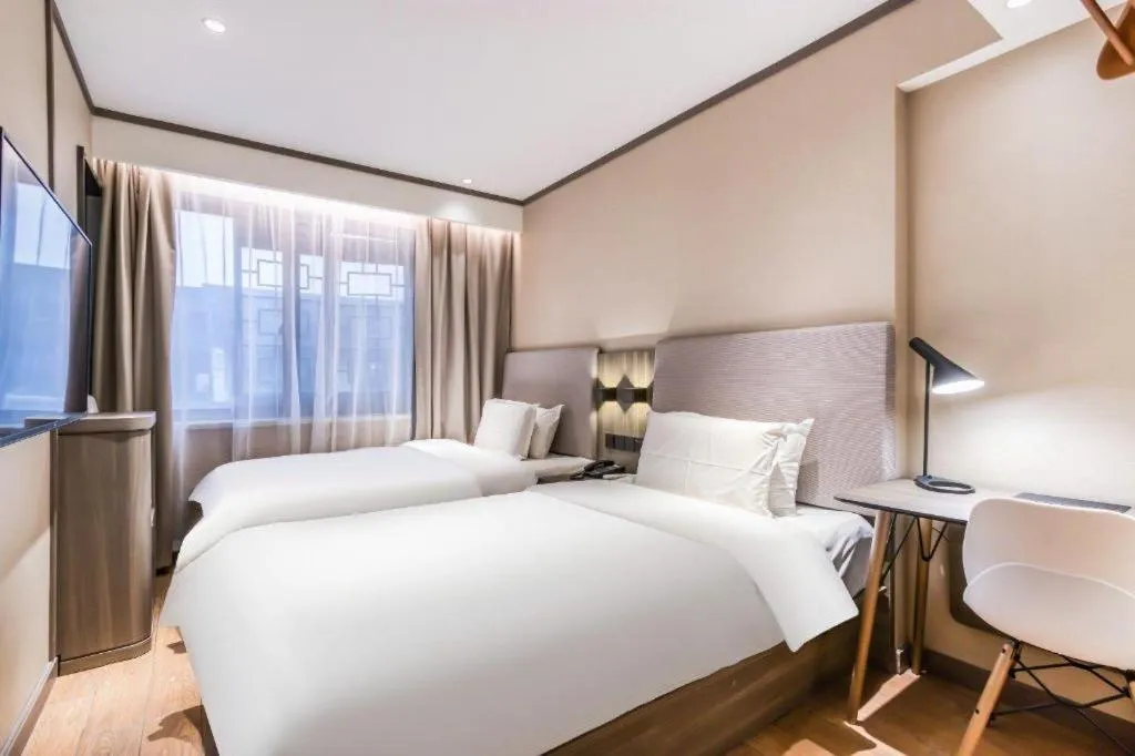 Bed in Hanting Hotel Hangzhou West Lake Longjing Road