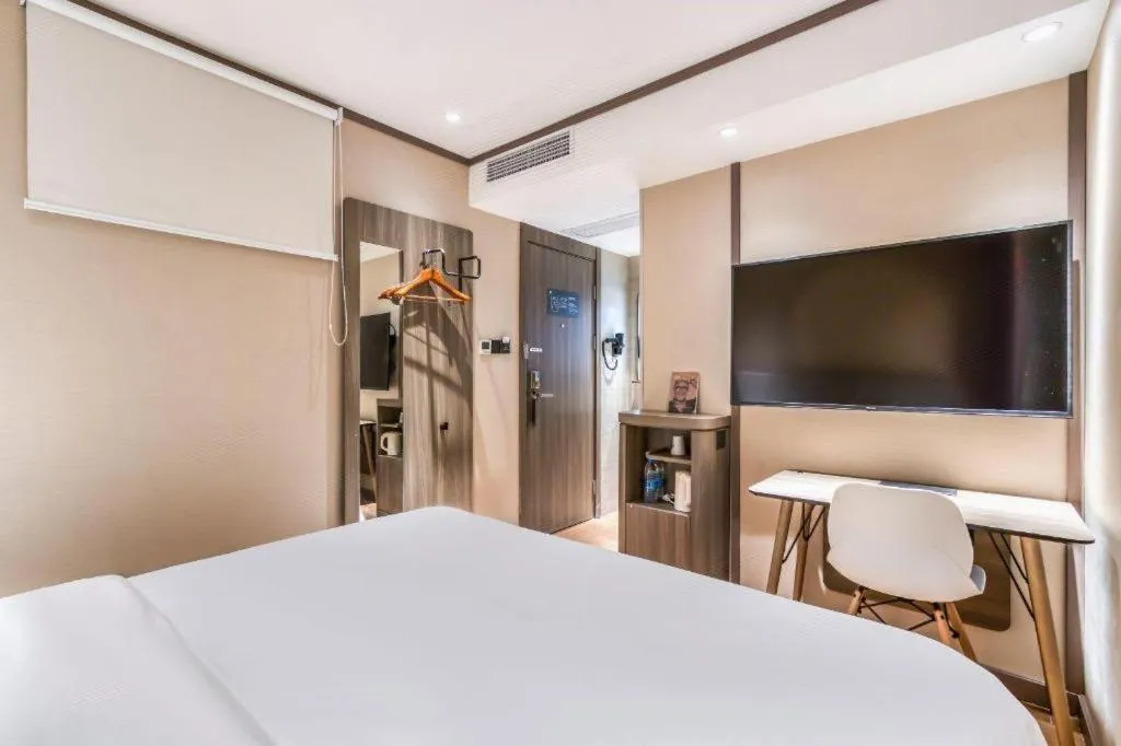 Bed in Hanting Hotel Hangzhou West Lake Longjing Road