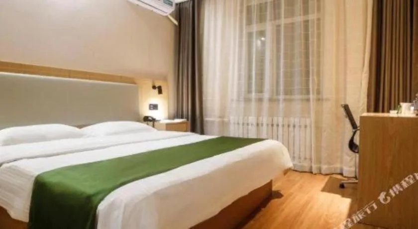 Bed in GreenTree Inn Liaoning Province Huludao City Xingcheng Shoushan Express Hotel