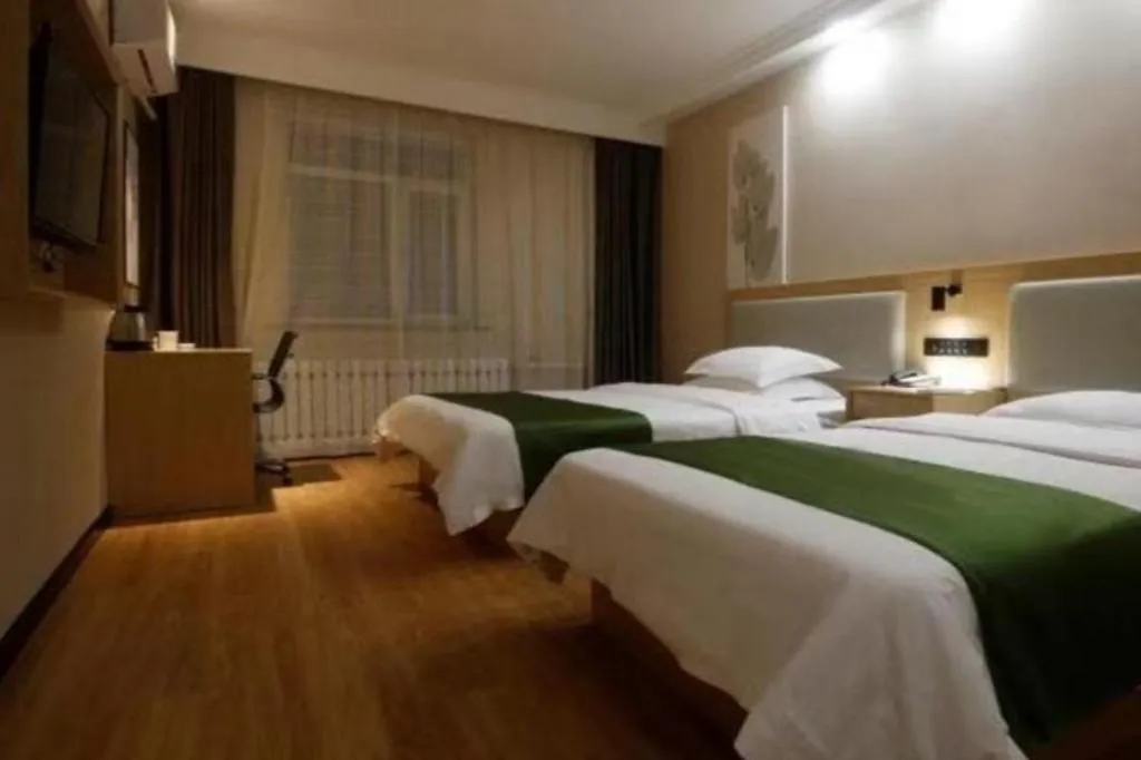 Bed in GreenTree Inn Liaoning Province Huludao City Xingcheng Shoushan Express Hotel
