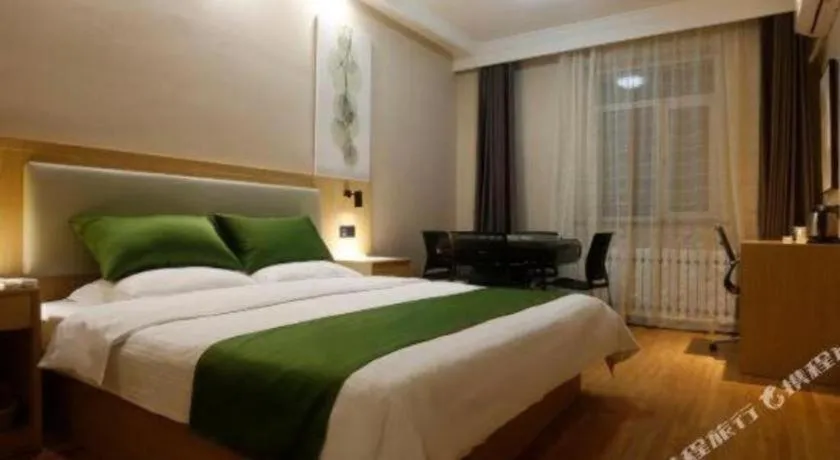 Bed in GreenTree Inn Liaoning Province Huludao City Xingcheng Shoushan Express Hotel