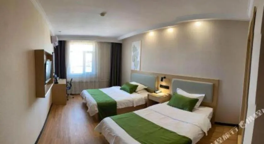 Bed in GreenTree Inn Liaoning Province Huludao City Xingcheng Shoushan Express Hotel