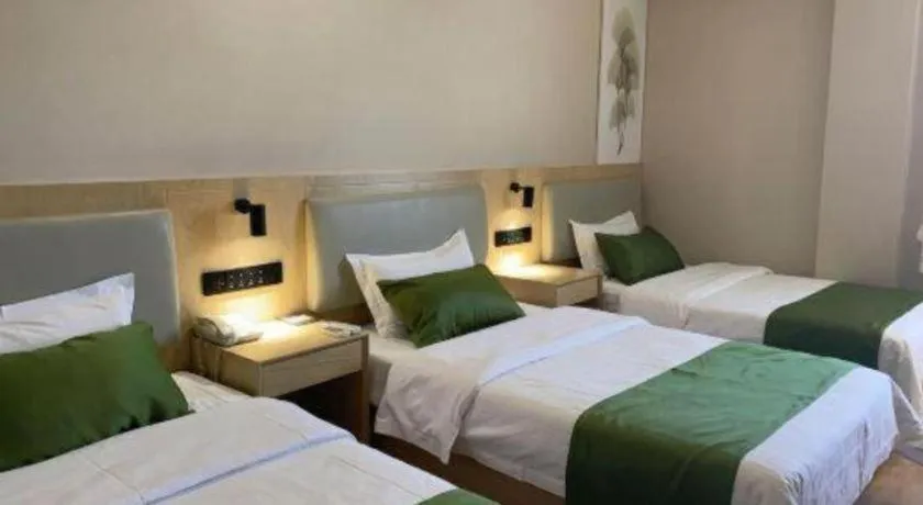 Bed in GreenTree Inn Liaoning Province Huludao City Xingcheng Shoushan Express Hotel