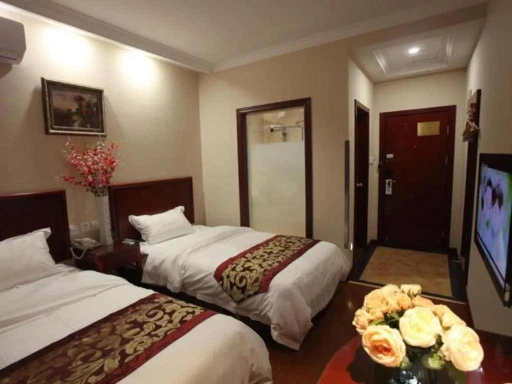 Bed in GreenTree Inn Liaoning Province Huludao City Xingcheng Shoushan Express Hotel