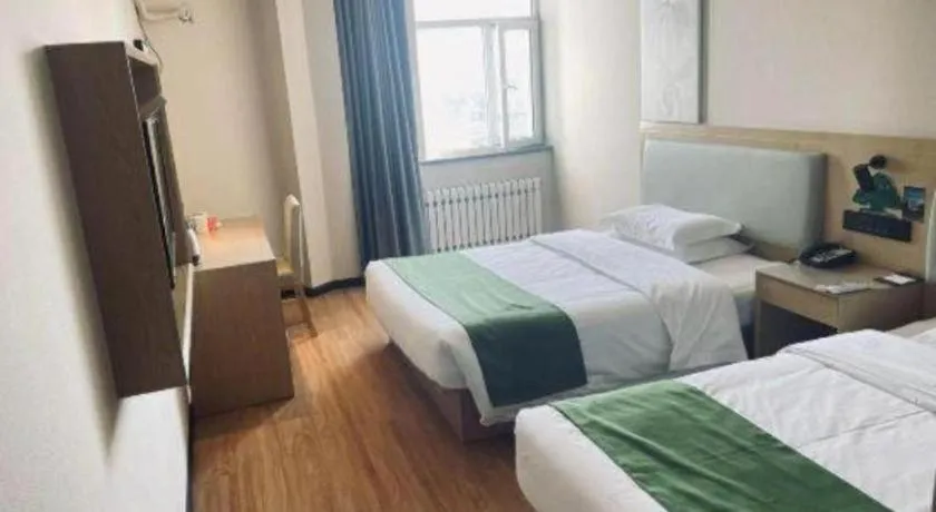 Bed in GreenTree Inn Liaoning Province Huludao City Xingcheng Shoushan Express Hotel