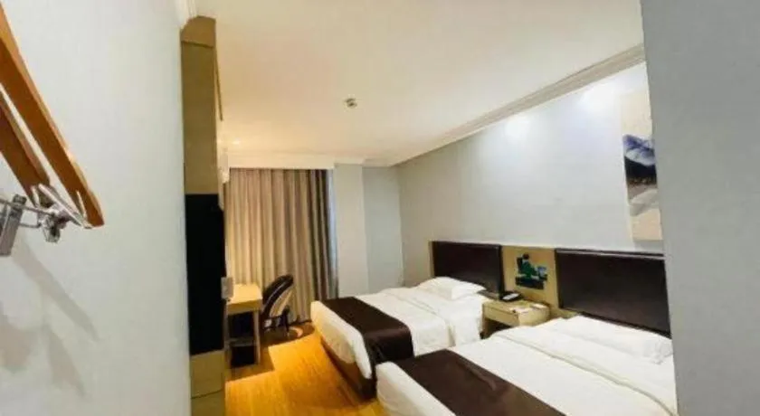 Bed in GreenTree Inn Liaoning Province Huludao City Xingcheng Shoushan Express Hotel