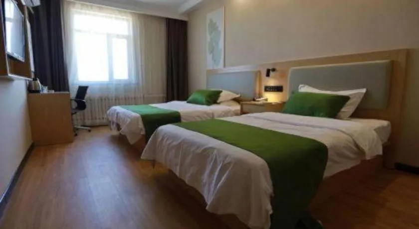 Bed in GreenTree Inn Liaoning Province Huludao City Xingcheng Shoushan Express Hotel