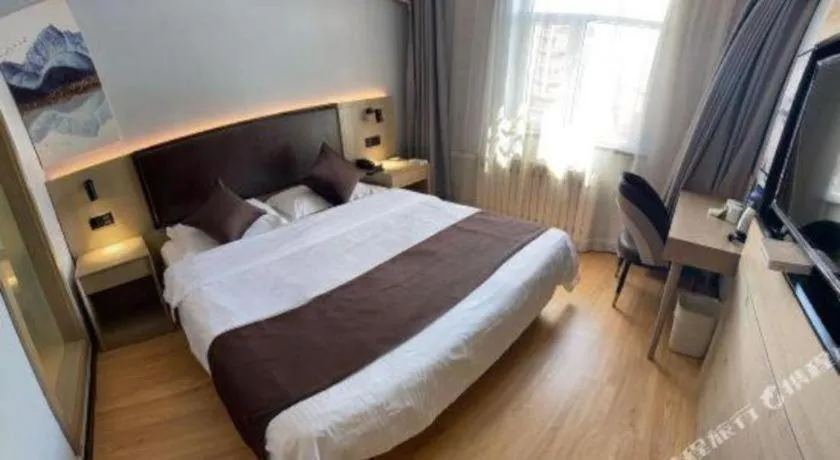 Bed in GreenTree Inn Liaoning Province Huludao City Xingcheng Shoushan Express Hotel