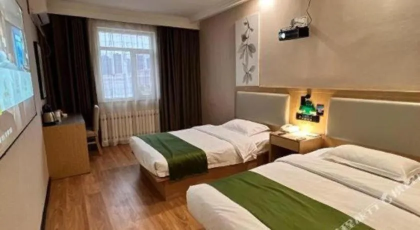 Bed in GreenTree Inn Liaoning Province Huludao City Xingcheng Shoushan Express Hotel