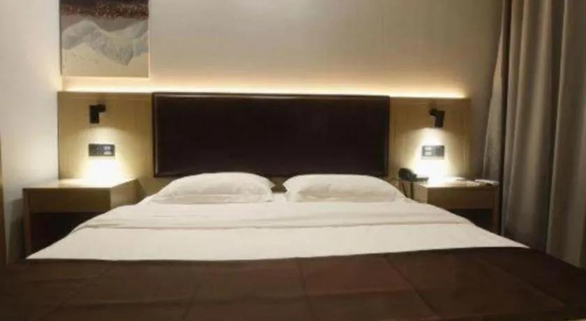 Bed in GreenTree Inn Liaoning Province Huludao City Xingcheng Shoushan Express Hotel