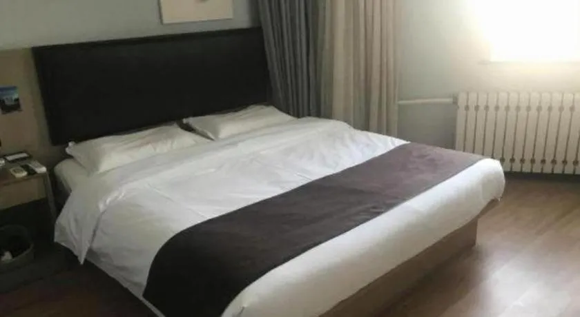 Bed in GreenTree Inn Liaoning Province Huludao City Xingcheng Shoushan Express Hotel