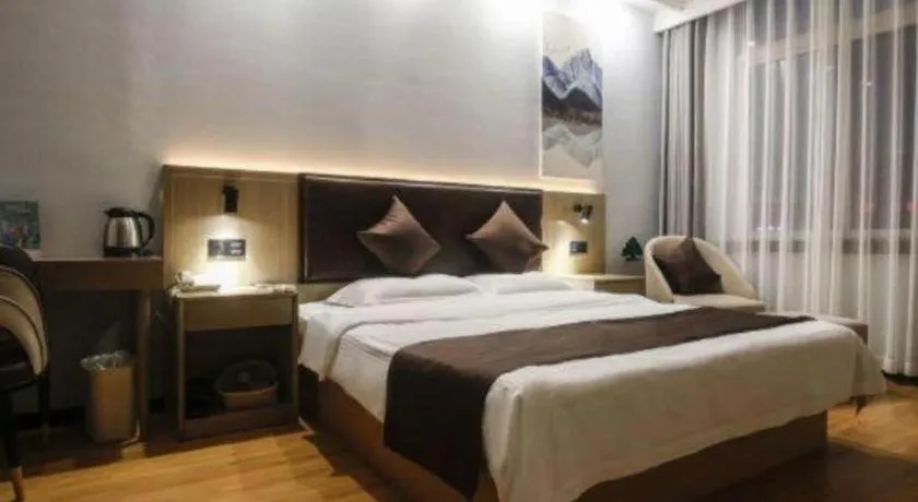 Bed in GreenTree Inn Liaoning Province Huludao City Xingcheng Shoushan Express Hotel