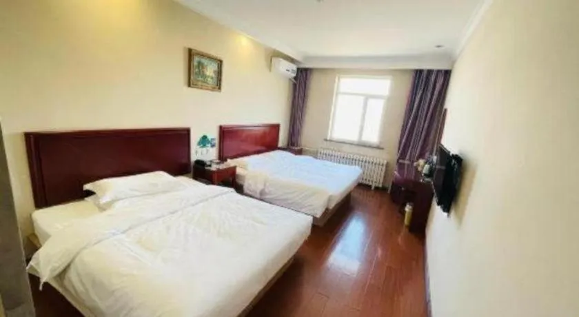Bed in GreenTree Inn Liaoning Province Huludao City Xingcheng Shoushan Express Hotel